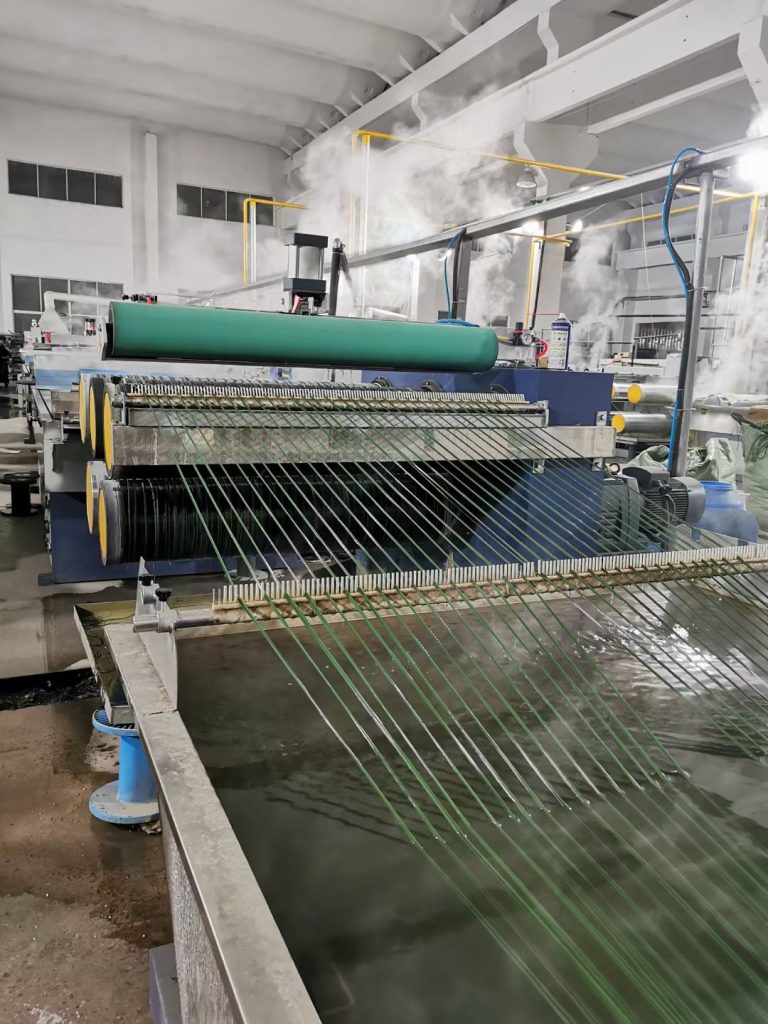 High-speed artificial grass production line at LMD Turf manufacturing facility